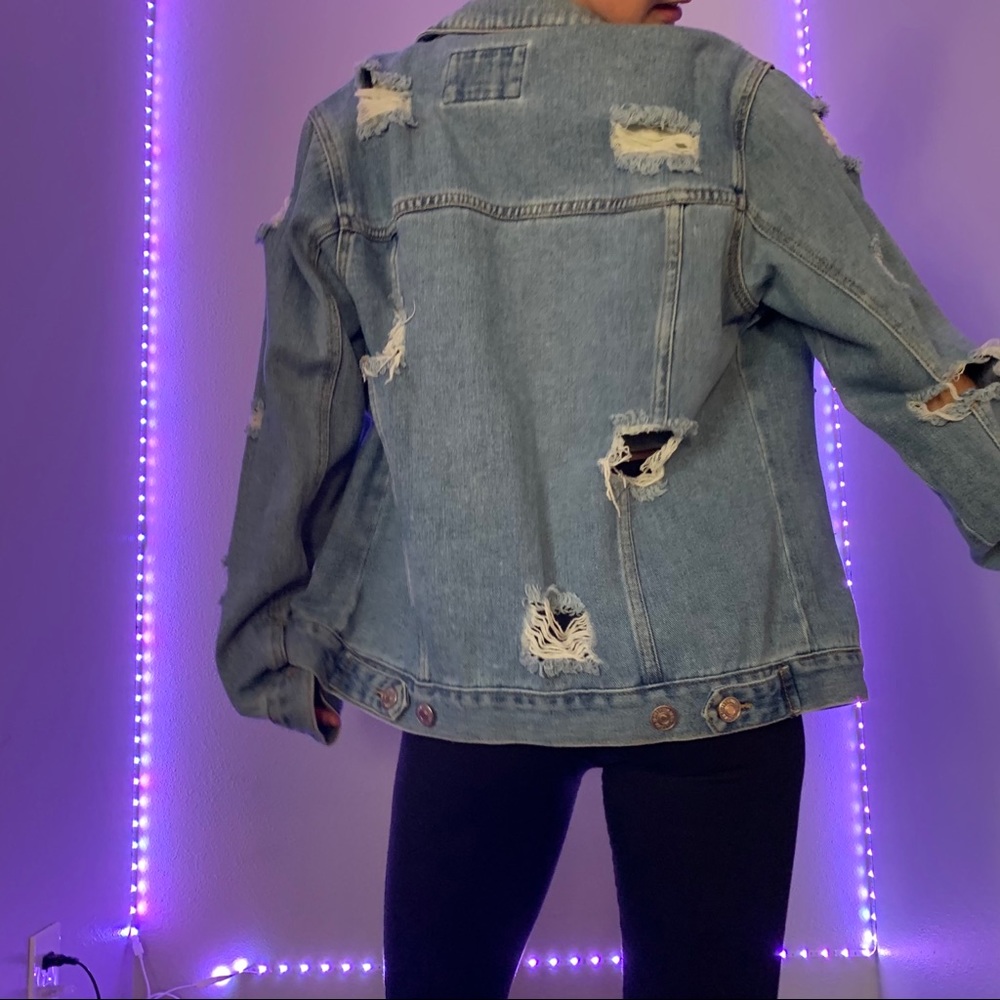 Distressed light denim jacket